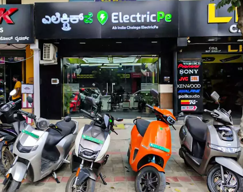 ElectricPe showoom in Bengaluru displaying electric scooters from various brands under one roof